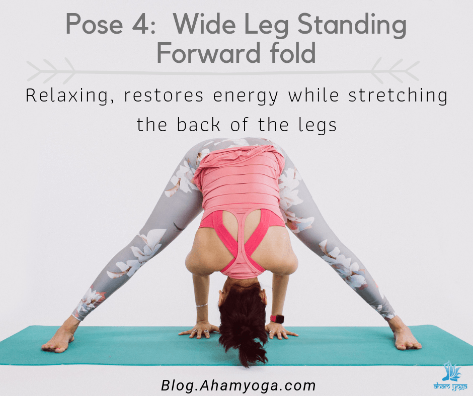 Wide leg standing forward fold stretches the legs and restores energy